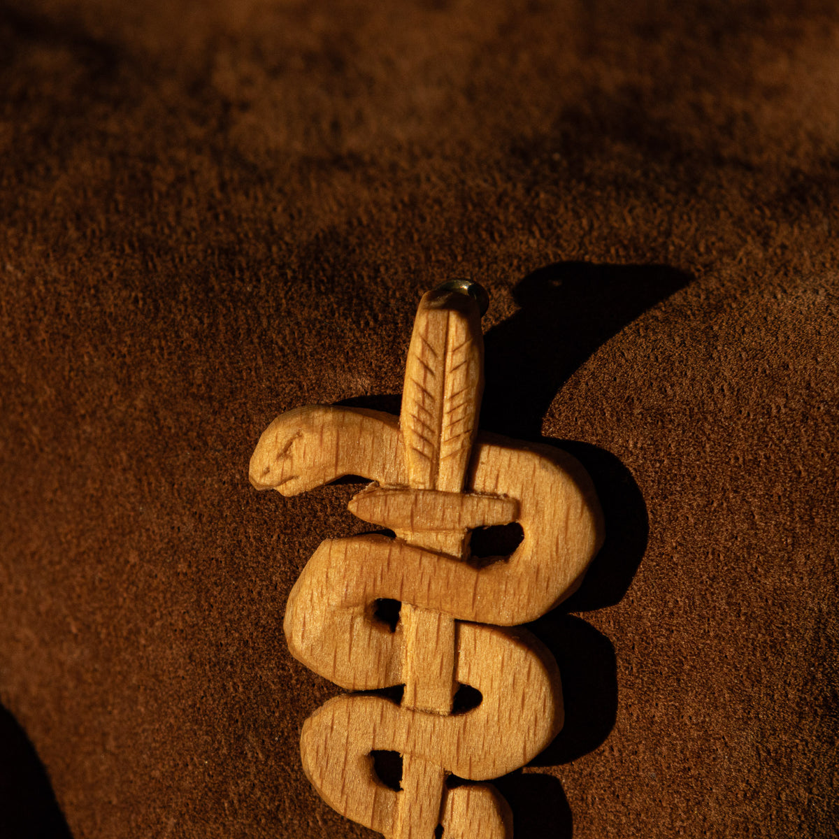 Snake on a Sword Oak Pendant Carving